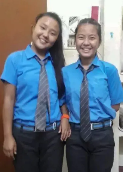 Two Tibetan students in their school uniforms